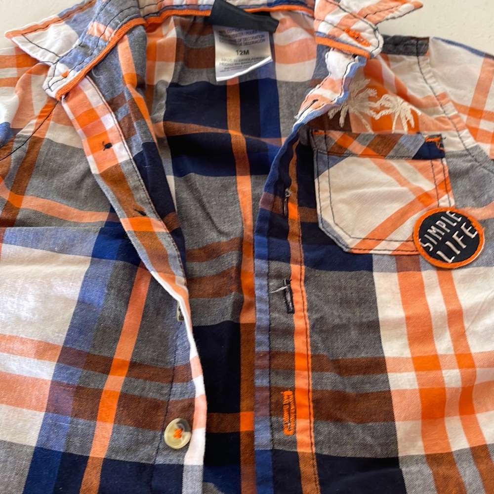 A Boys Rock 12 months Button down short sleeve shirt.